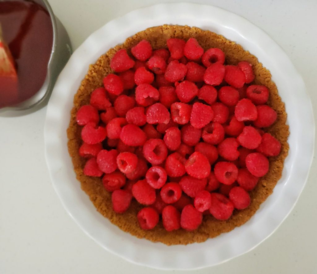 raspberries added to graham cracker crust